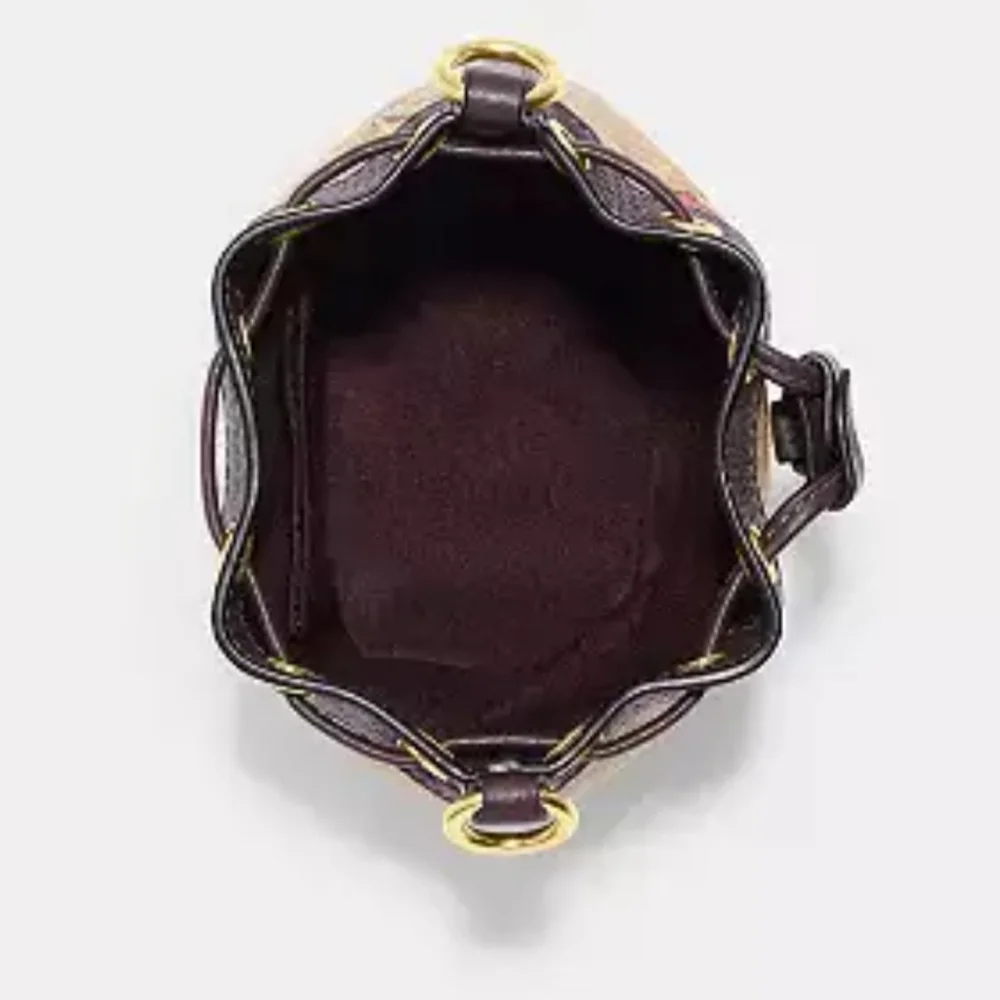 COACH Bags Mini Dempsey Bucket Bag in Signature Canvas with Heart And Star Print - Picture 6 of 11